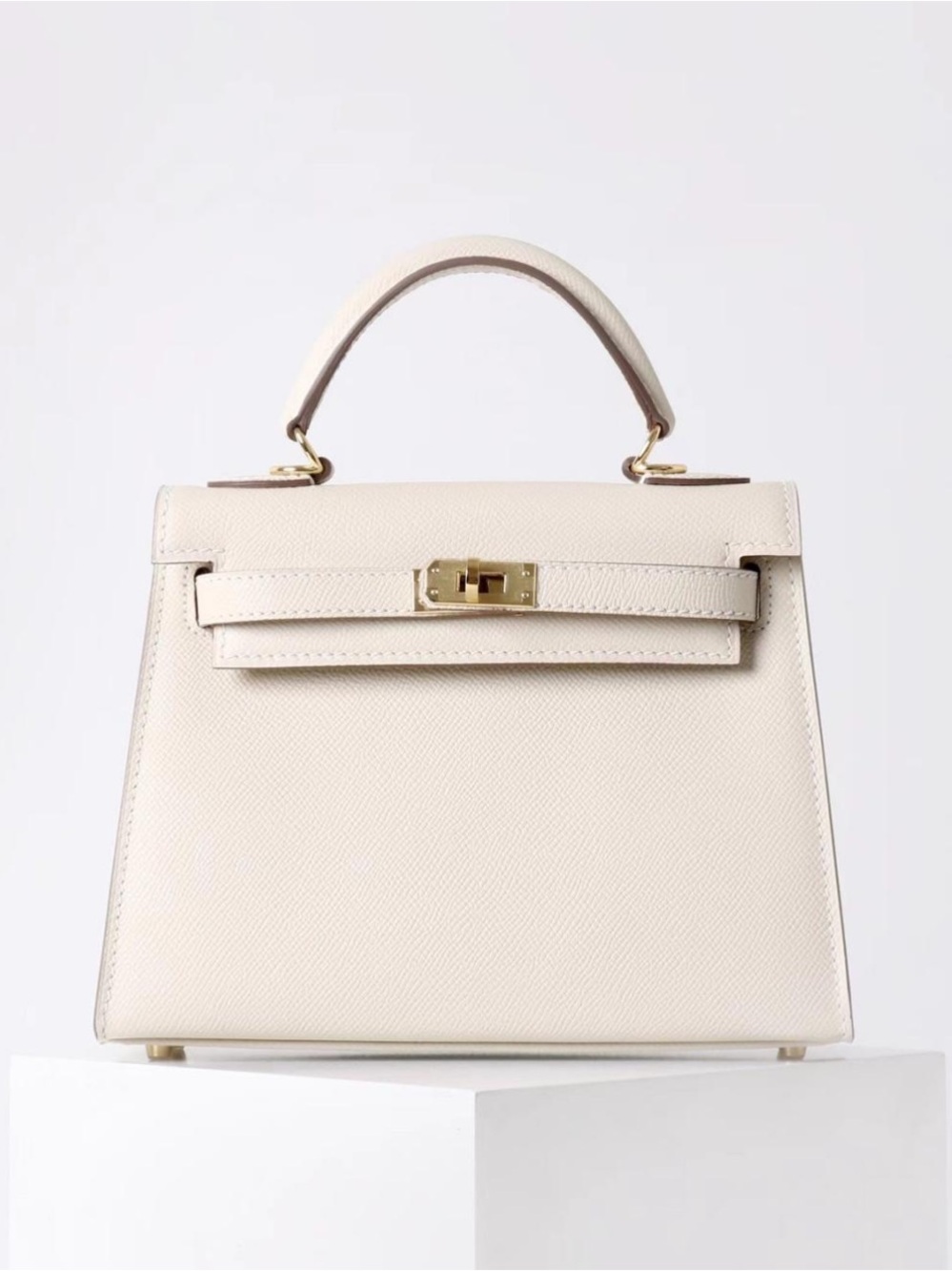 Structured Cream Leather Top-Handle Shoulder Bag with Gold Accent
